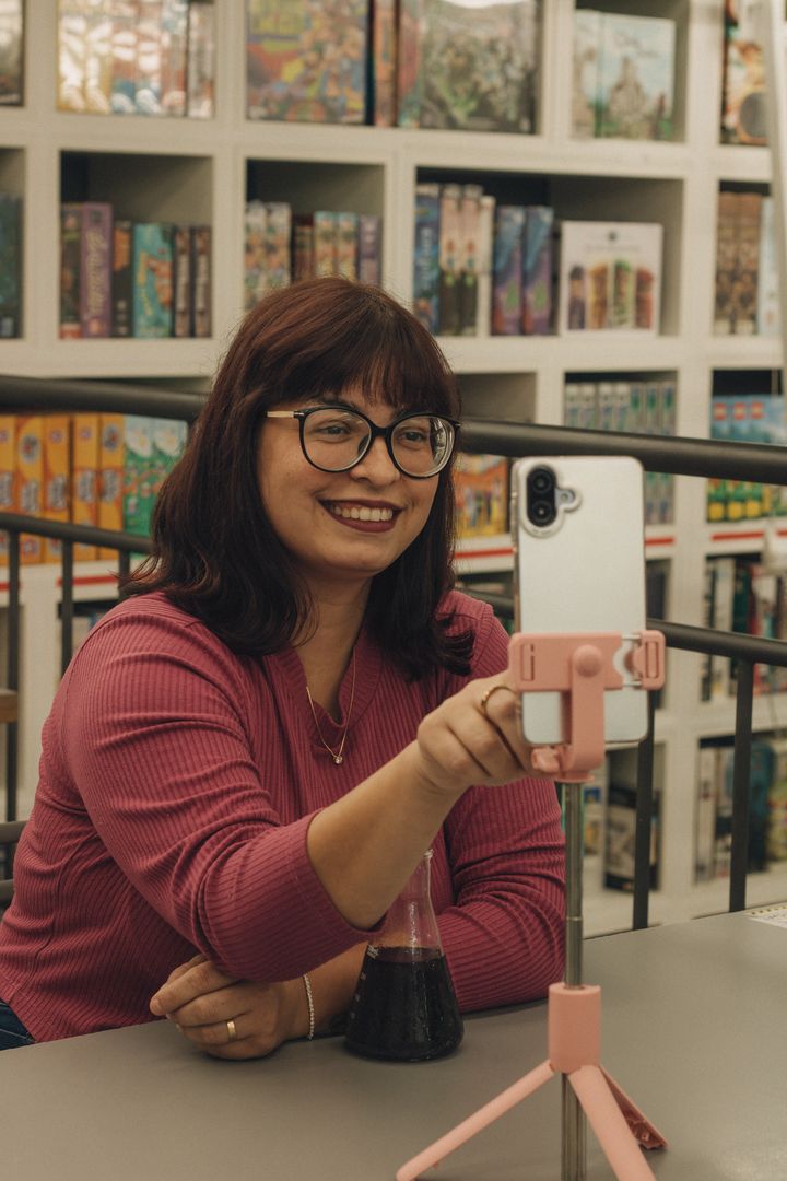 Creator recording a reel on her phone